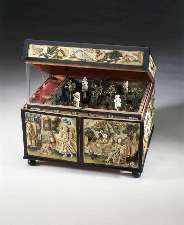 This box is completely covered in stumpwork. It dates to 1660-1685, peak years of Stuart stumpwork techniques. This is in the collections of the Victoria &amp; Albert Museum in England.